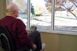 Evergreen Senior Living | Resident cycling indoors