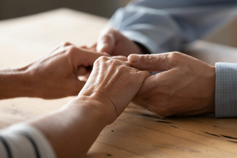Meadow Lake | Seniors holding hands